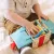 Melissa & Doug Fa doboz meglepetés játékkal